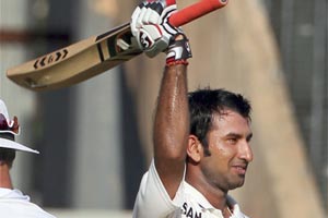 Cheteshwar Pujara celebrates his century during the first day of second India-England Test match at Wankhade Stadium in Mumbai. (PTI) Cheteshwar Pujara celebrates his century during the first day of second India-England Test match at Wankhade Stadium in Mumbai. (PTI)
