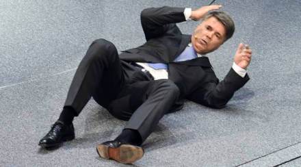 BMW CEO Harald Krueger collapses during the BMW presentation on the first press day of the Frankfurt Auto Show IAA in Frankfurt, Germany, Tuesday, Sept. 15, 2015. The car show runs through Sept. 27. (AP Photo/Jens Meyer)