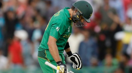 Pakistan's Shahid Afridi walks from the field after he was dismissed for 14 runs during their ICC World Twenty20 2016 cricket match against Australia in Mohali, India, Friday, March 25, 2016. (AP Photo/Altaf Qadri)