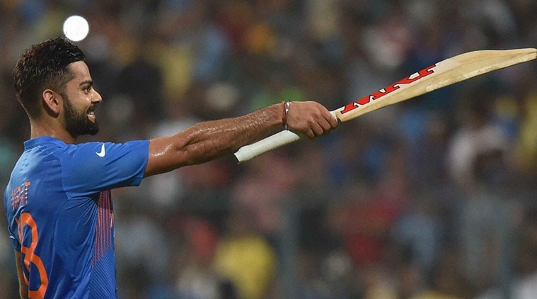 Kolkata: Indian Virat Kohli celebrates after beating Pakistan by 6 wickets during the ICC T20 World cup at Eden Garden in Kolkata on Saturday. PTI Photo by Ashok Bhaumik(PTI3_19_2016_000327B)