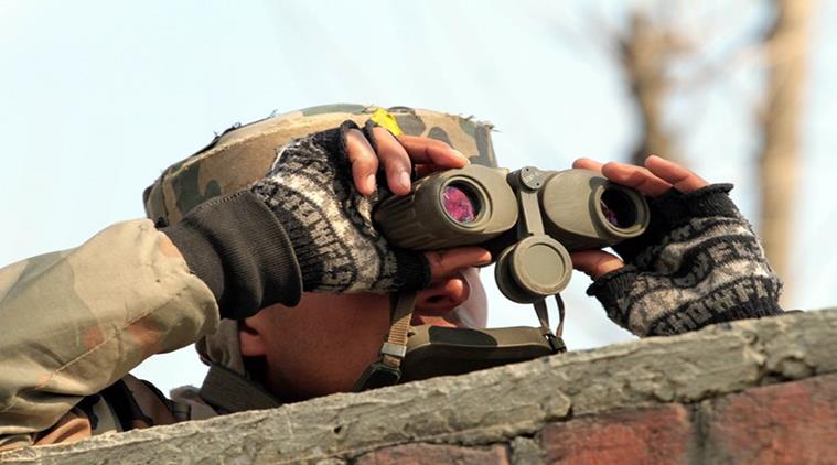 Army soldier uses binocular to locate militant positions near the site of a gunbattle in Sempora Pampore, some 15 km south of Srinagar on Monday. The encounter that started on saturday (FEB 20) entered third day on Monday.EXPRESS PHOTO BY SHUAIB MASOODI 22-02-2016. Army soldier uses binocular to locate militant positions near the site of a gunbattle in Sempora Pampore, some 15 km south of Srinagar on Monday. The encounter that started on saturday (FEB 20) entered third day on Monday.EXPRESS PHOTO BY SHUAIB MASOODI 22-02-2016.