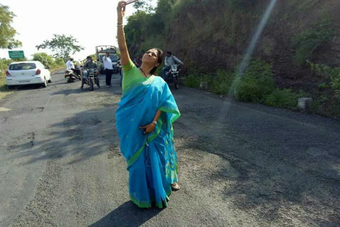 Supriya Sule, Selfie with potholes, Katraj, Undri, bypass, Bopdev ghat