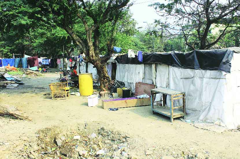slum dwellers on open land