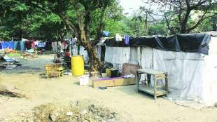 slum dwellers on open land