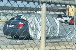 COVID 19 नंबर प्लेट असणाऱ्या BMW गाडीमुळे गूढ वाढले; गाडीवरील कव्हर उडाला आणि…