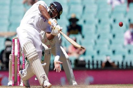 India's Rishabh Pant hits a six during play on the final day of the third cricket Test between India and Australia at the Sydney Cricket Ground. (AP)
