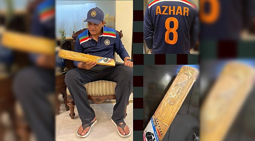 Mohammed azharuddin showed his bat to the fans which he sets world record