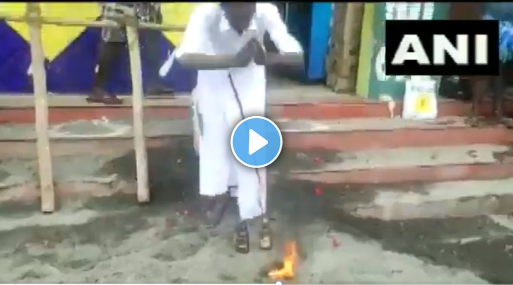 A local in Madurai worships bottles of liquor in Tamil Nadu