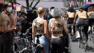 Berlin bike riders go topless For Gender Equality