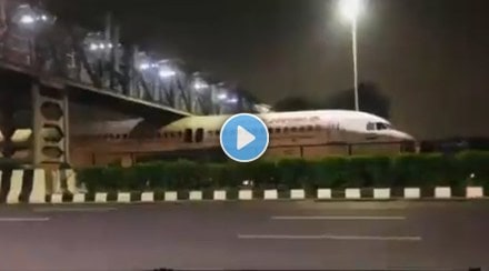 Plane Gets Stuck Under Foot Over Bridge