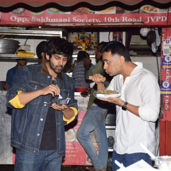 Chinese van food on Lamborghini bonnet Kartik Aaryan roadside foodscape on way back from Bigg Boss 15