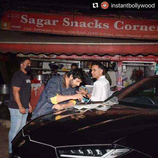 Chinese van food on Lamborghini bonnet Kartik Aaryan roadside foodscape on way back from Bigg Boss 15