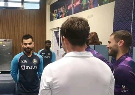 Scotland players visit Indian dressing room