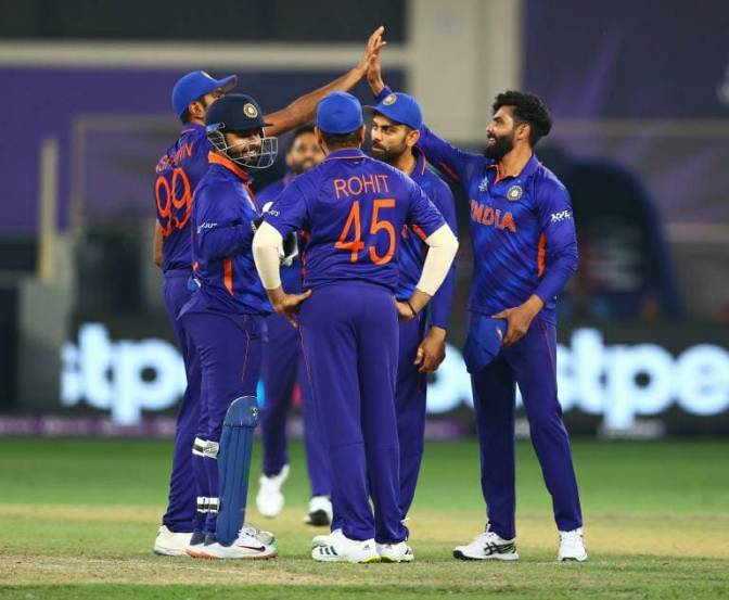 Scotland players visit Indian dressing room