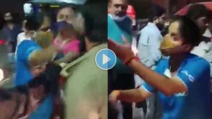 Woman beats taxi driver