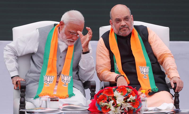 why amit shah have photos of veer savarkar and chanakya at his home