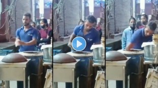 man preparing Tandoori roti with spitting