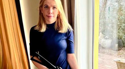 Ukrainian female MP raises kalashnikov rifle Ukrainian female MP raises kalashnikov rifle