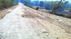 मोडगाव-धुंदलवाडी रस्त्याची चाळण