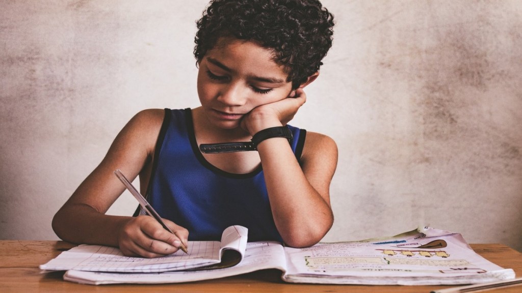 boy writing pixabay