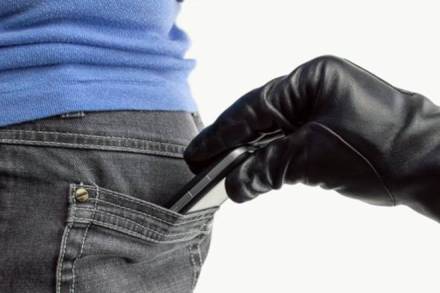 Phone thief stealing a woman Phone thief stealing a woman