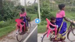 VIRAL VIDEO : लेकाला सायकलवर आरामात बसता यावं म्हणून आईने केलेला हा Desi Jugaad एकदा पाहाच