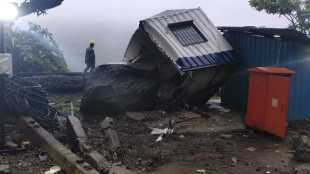 land slide near monkey hill cabin, no effect on railway services