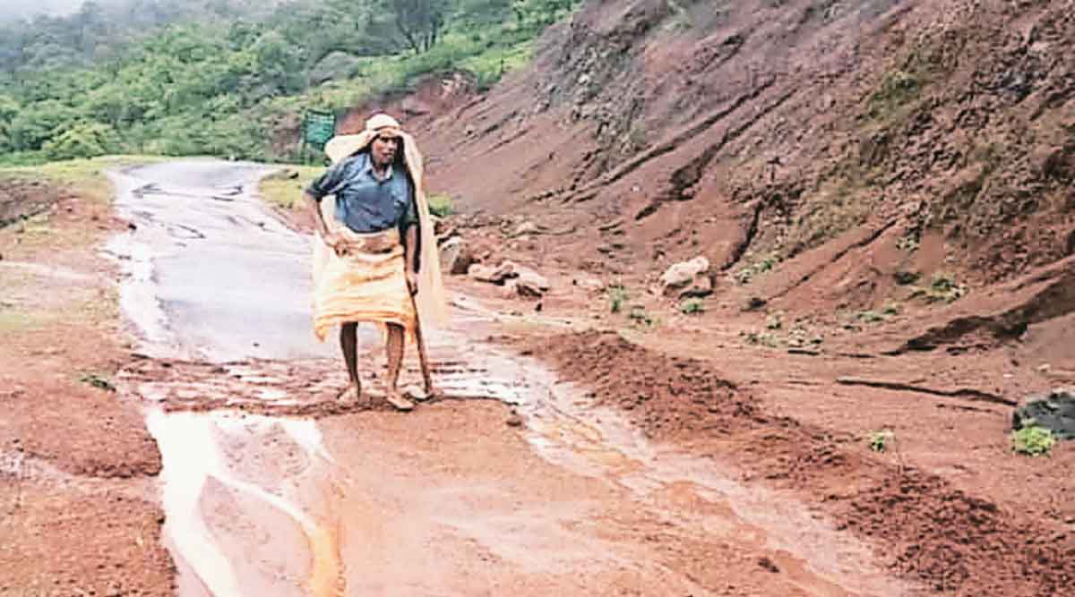 mud debris on road going toward vajrai waterfall clean by two old man ...