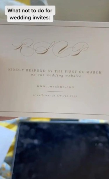 URL of the PornHub website on wedding card 