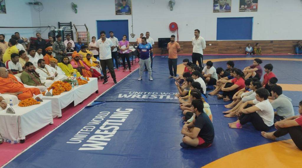 World Wrestling Championship trail, womens wrestling match stopped for blessings of Saints