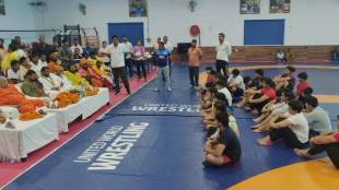 World Wrestling Championship trail, womens wrestling match stopped for blessings of Saints