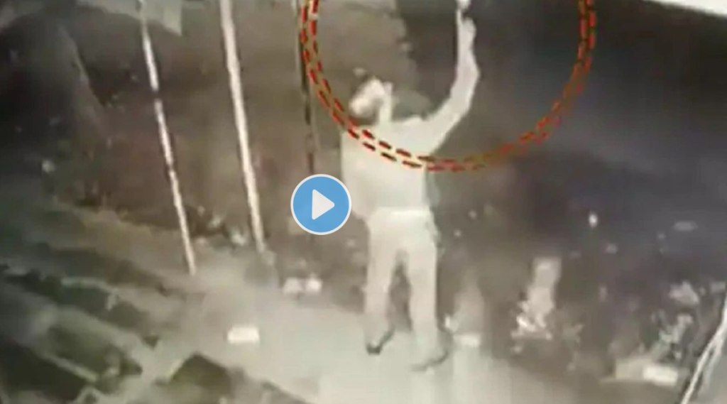 police stealing bulb from outside store