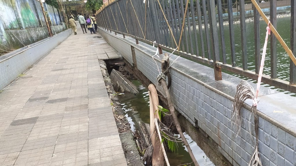 vimala lake damage footpath center of nagarparishad uran