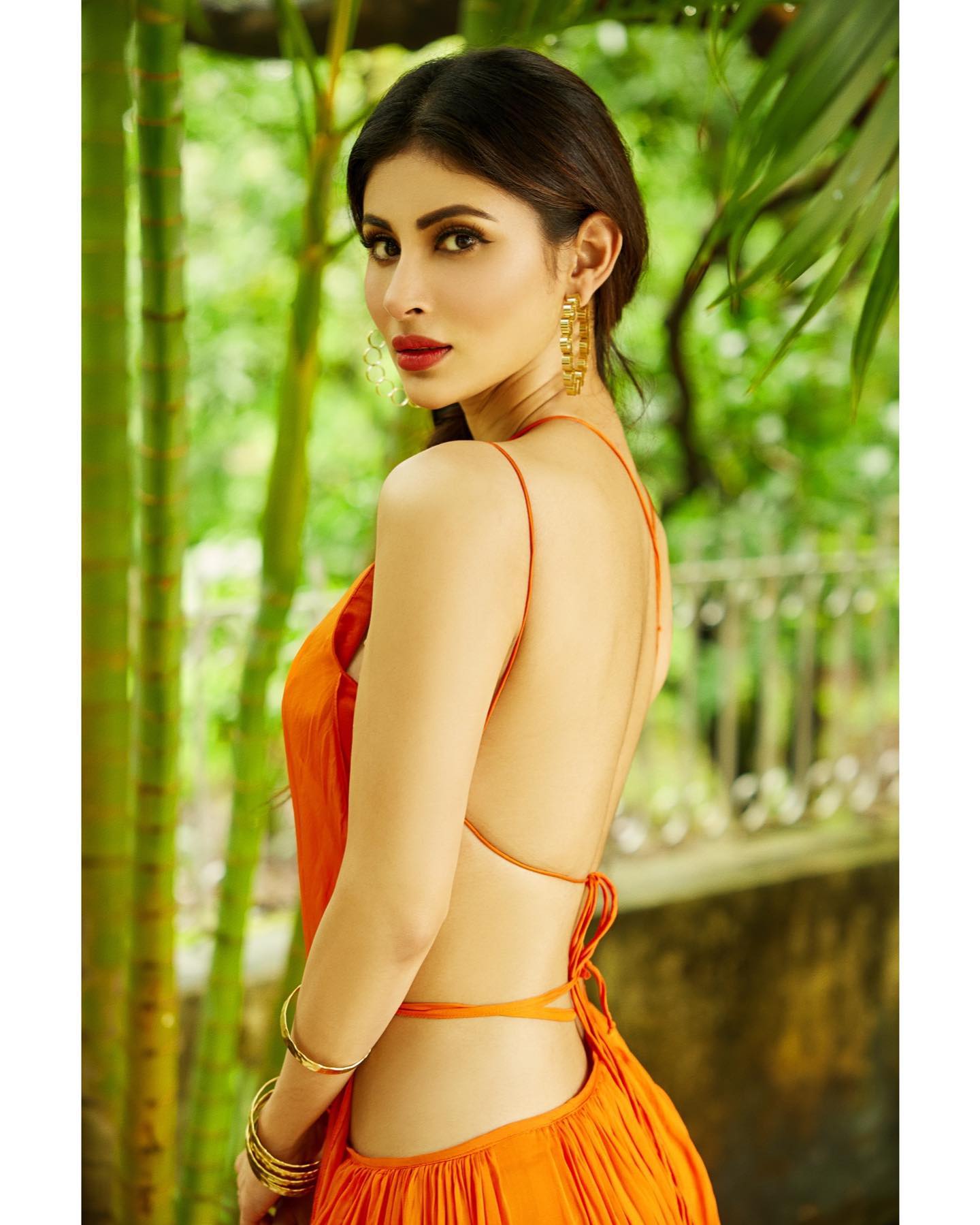 mouni roy in goa in orange outfit