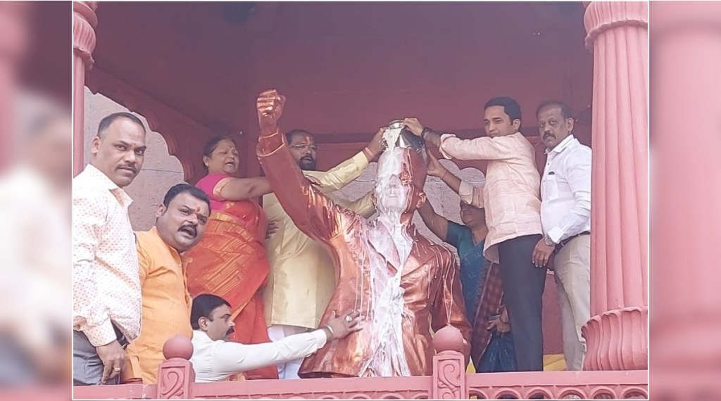 Milk anointing to Savarkars statue from BJP workers in Pune