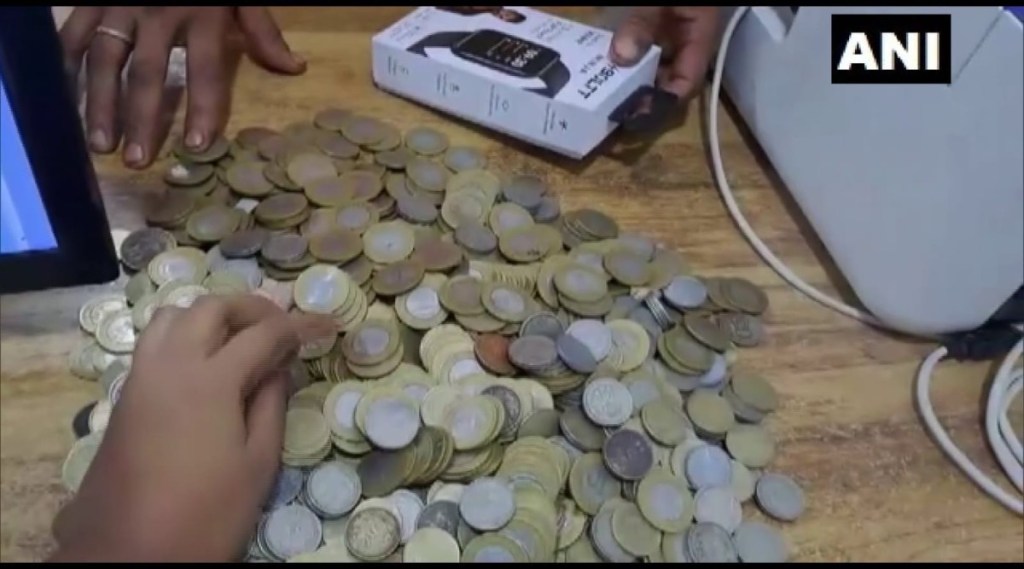 Viral news Man in assam buys dream bike with sack full of coins he saved for many years