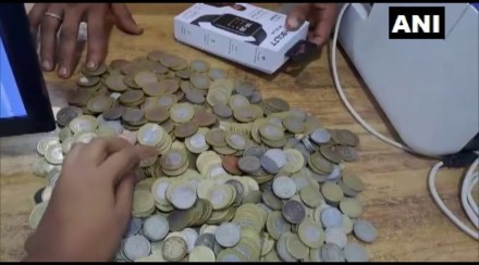 Viral news Man in assam buys dream bike with sack full of coins he saved for many years