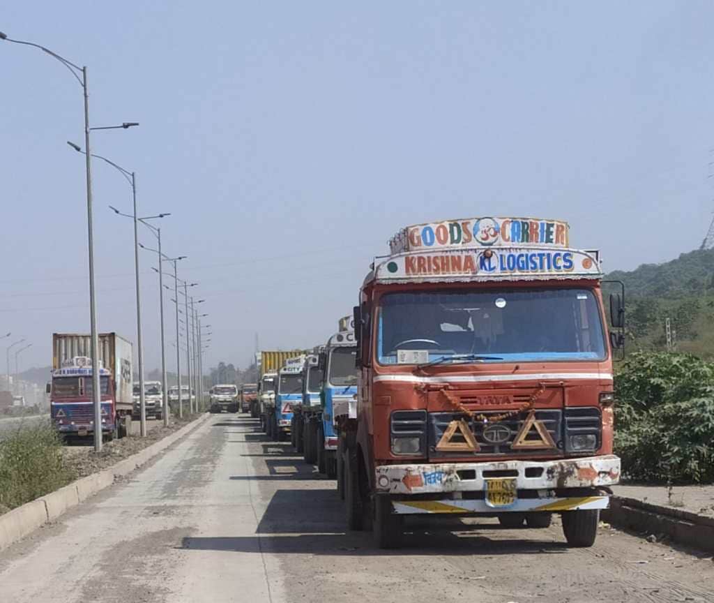 Container parking on service roads and also on regular roads in Uran