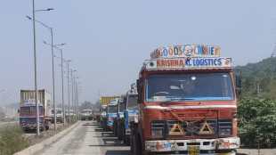 Container parking on service roads and also on regular roads in Uran