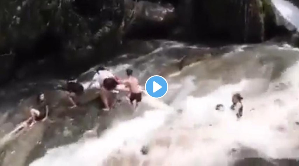 people at a philippines waterfall swept away by flash flood