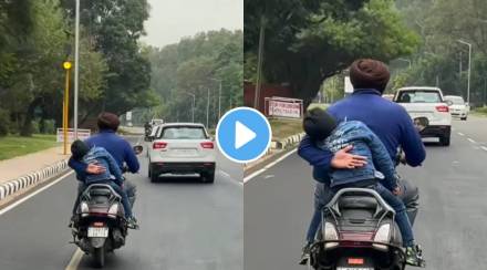 Watch how man prevents his son from falling off a moving scooter video goes viral