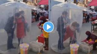 Viral video of chinese couples jugad Unique protection shield from covid 19