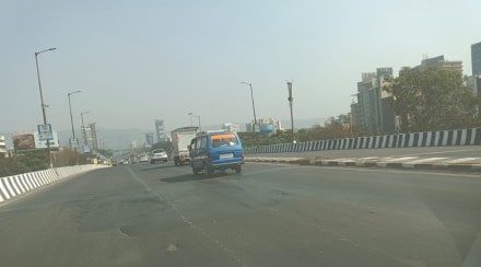 Melted asphalt from Vashi flyover to Panvel route is dangerous Melted asphalt from Vashi flyover to Panvel route is dangerous