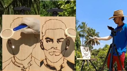 man created virat kohli image with the help of magnifing glass trending video