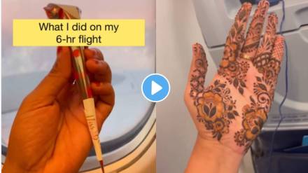 woman applied mehndi in the plane viral video woman applied mehndi in the plane viral video