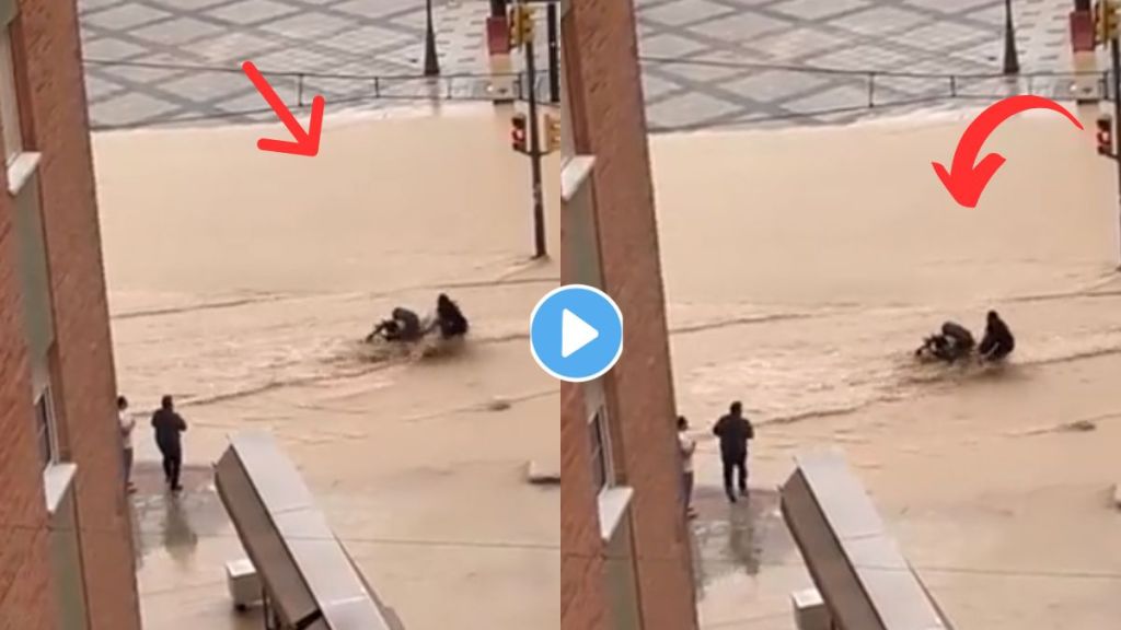 Man Saves Child In Flood Video Viral Man Saves Child In Flood Video Viral