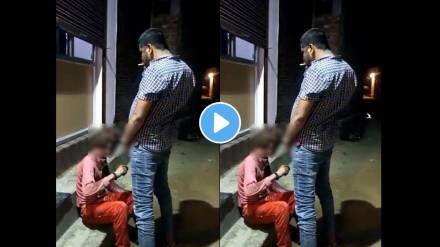 man-urinating-on-tribal-labourer