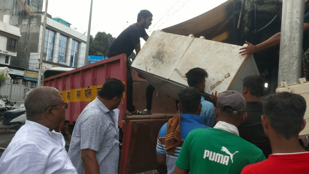 municipal corporation action confiscate handcarts trespassing steps jalgaon