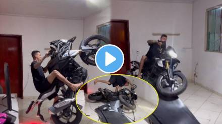 man performing dangerous bike stunt in room shocking stunt video goes viral