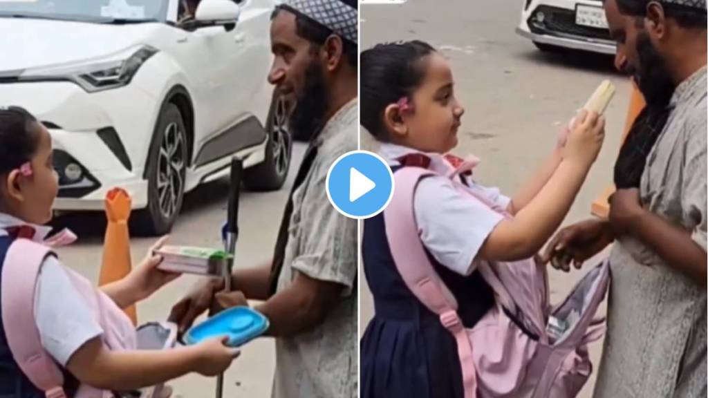 trending today school girl shares her tiffin with blind beggar video viral on internet